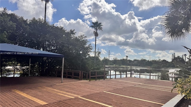 deck featuring a water view