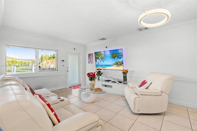 tiled living area with crown molding, baseboards, and visible vents