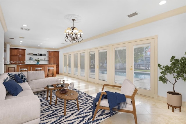 living area featuring french doors, visible vents, recessed lighting, and an inviting chandelier