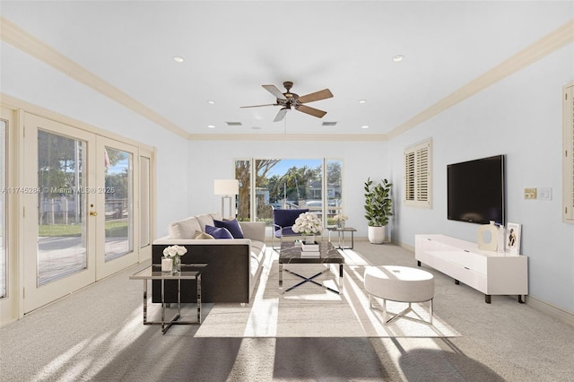 carpeted living room featuring crown molding, ceiling fan, recessed lighting, french doors, and baseboards