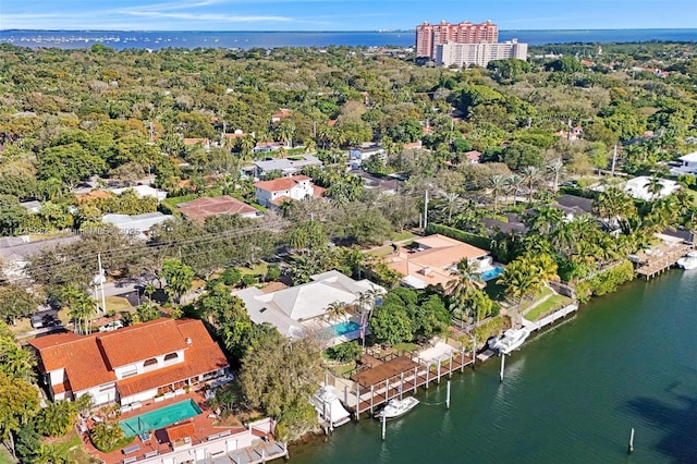 birds eye view of property featuring a water view and a residential view