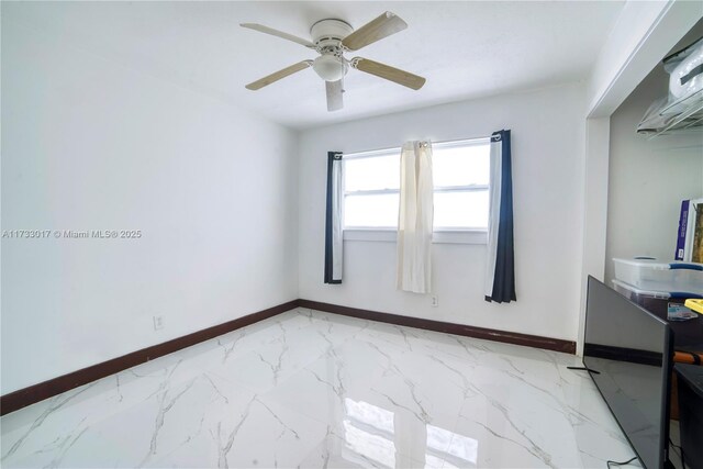 unfurnished room with ceiling fan