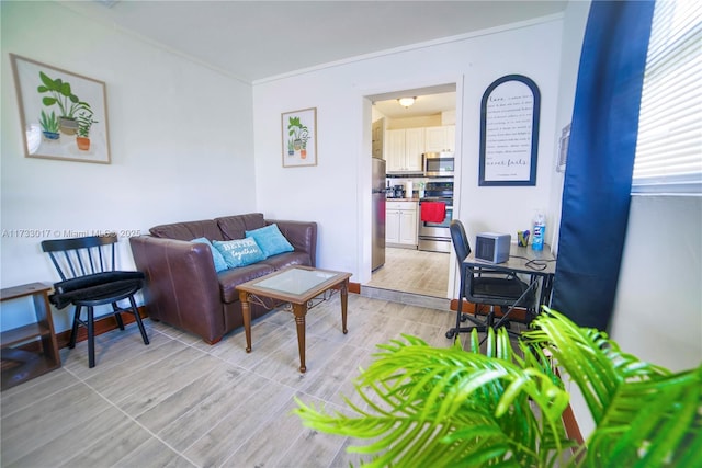 living room featuring crown molding