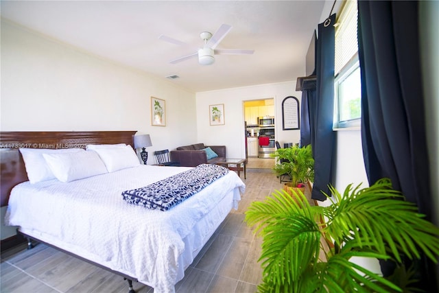 bedroom featuring ceiling fan