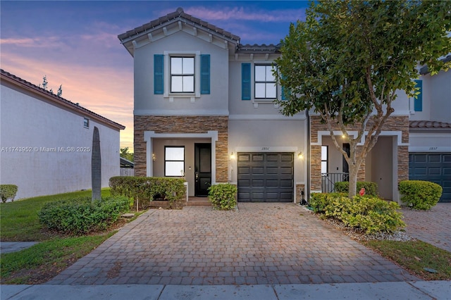 view of front of house with a garage