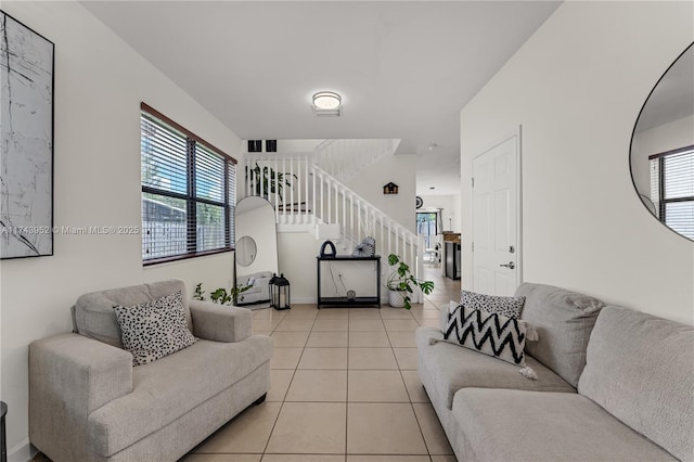 living room with light tile patterned floors