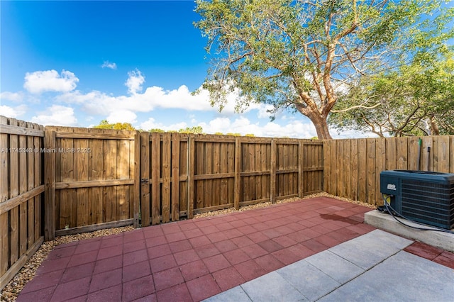 view of patio with central AC