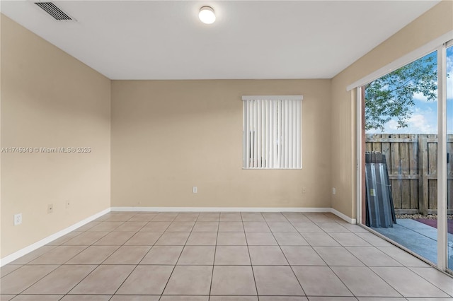 empty room featuring light tile patterned flooring