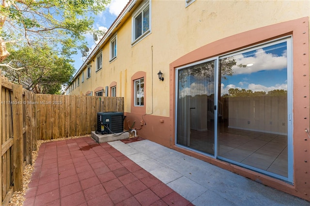 view of patio featuring central air condition unit