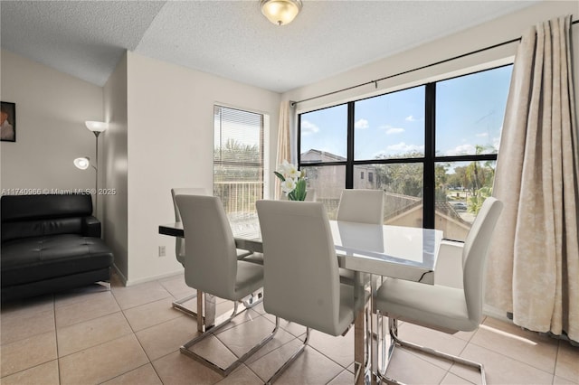 2866 S University Dr Unit 5307, Davie, FL 33328 - tiled dining space featuring baseboards and a textured ceiling