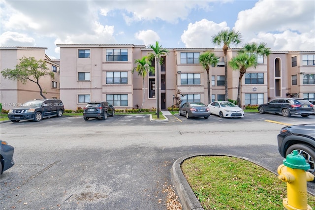 2866 S University Dr Unit 5307, Davie, FL 33328 - view of building exterior with uncovered parking