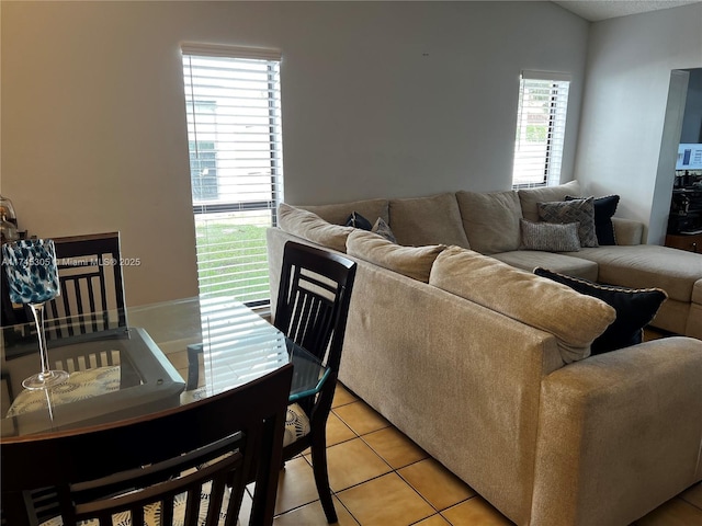 living area featuring light tile patterned flooring