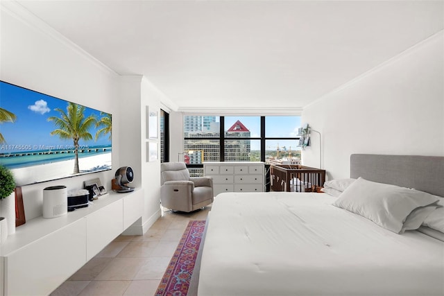 bedroom featuring crown molding and light tile patterned floors