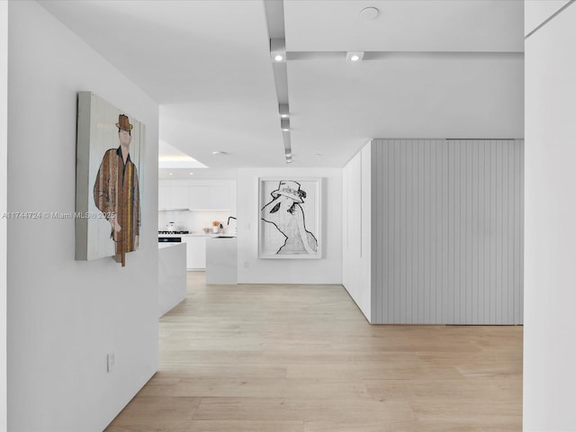 corridor featuring light wood-type flooring