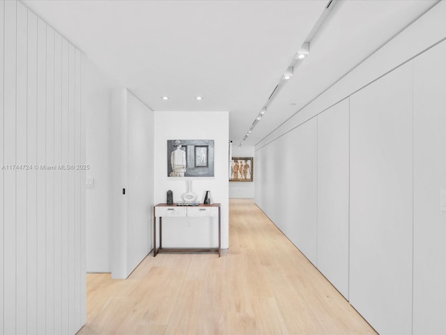 corridor with light wood finished floors