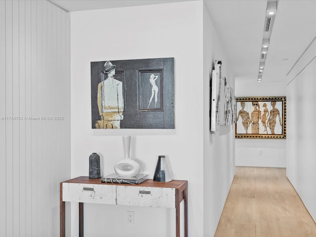 hall featuring light wood-style flooring
