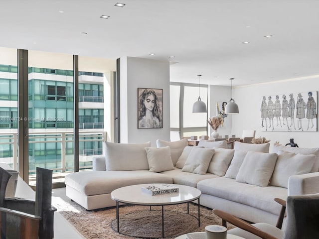 living room with expansive windows and recessed lighting