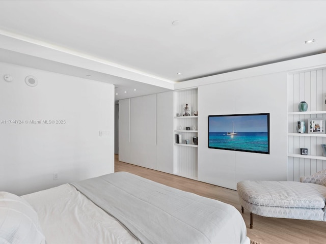 bedroom featuring light wood-style flooring