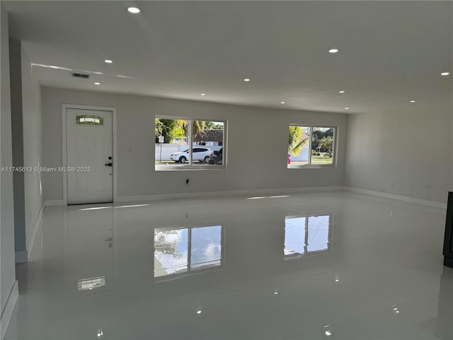 spare room featuring tile patterned flooring