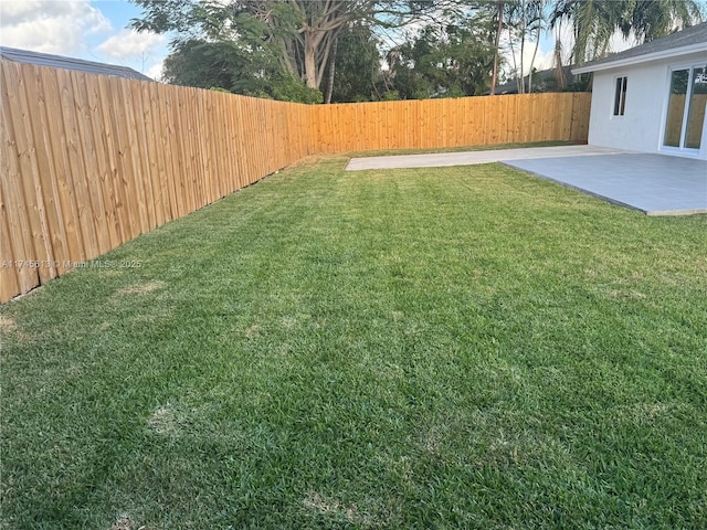 view of yard with a patio area