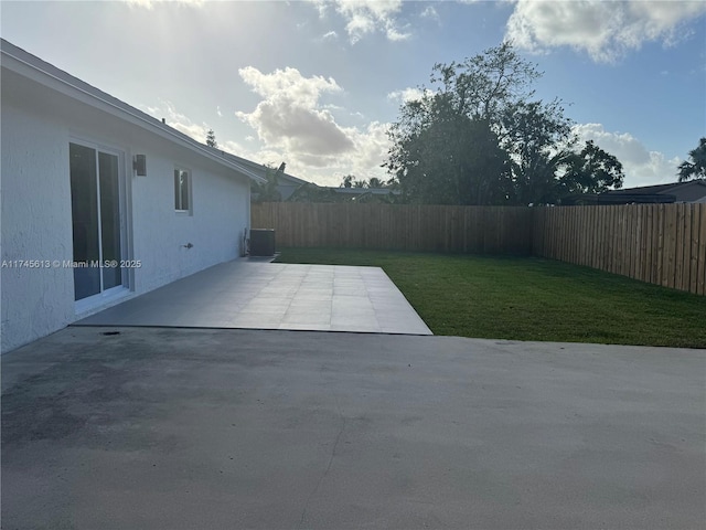 view of yard featuring a patio and cooling unit