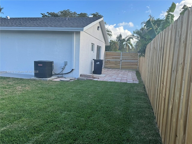 exterior space with a patio and central air condition unit