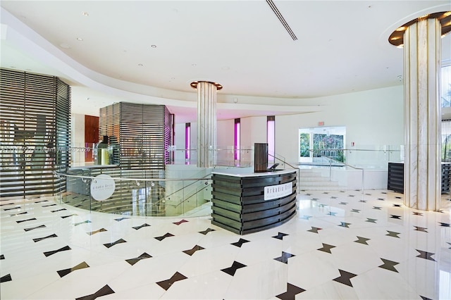 reception area with ornate columns