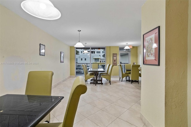 dining room featuring light tile patterned flooring