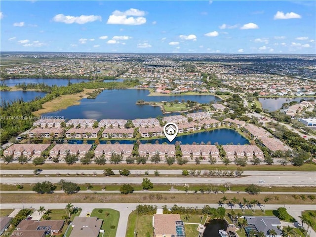 drone / aerial view featuring a water view