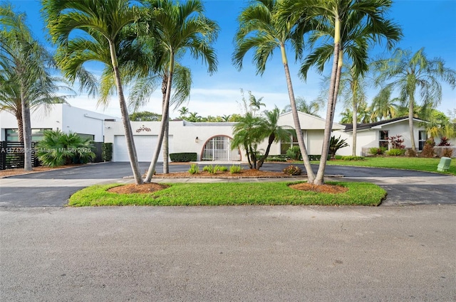 view of front of house featuring driveway and an attached garage