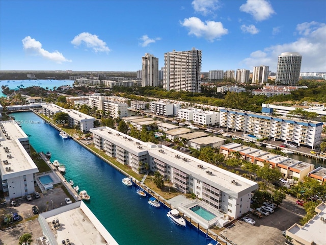 drone / aerial view with a water view and a view of city