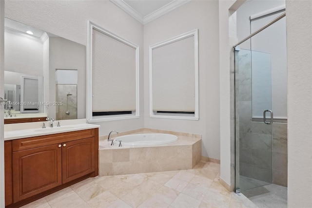 bathroom with vanity, crown molding, and plus walk in shower