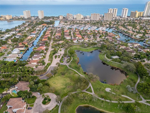 birds eye view of property featuring a water view