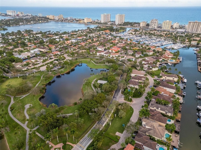 bird's eye view with a water view