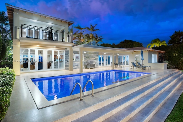 1500 NE 103rd St, Miami Shores, FL 33138 - outdoor pool featuring french doors and a patio area