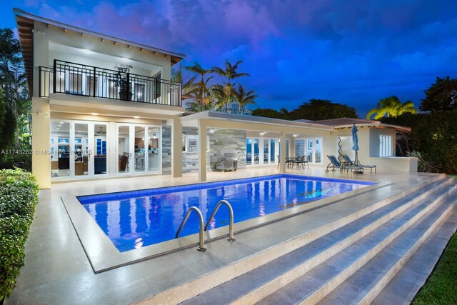 1500 NE 103rd St, Miami Shores, FL 33138 - outdoor pool featuring french doors and a patio area