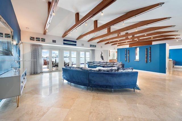 living area featuring rail lighting, french doors, baseboards, vaulted ceiling with beams, and visible vents