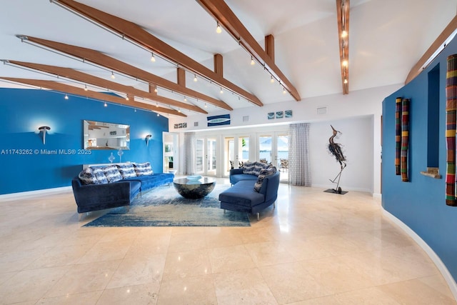 1500 NE 103rd St, Miami Shores, FL 33138 - tiled living area featuring rail lighting, french doors, and baseboards