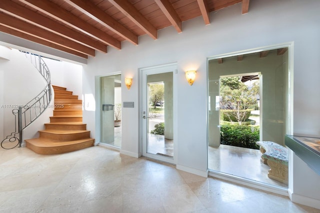 1500 NE 103rd St, Miami Shores, FL 33138 - doorway to outside with beamed ceiling, wood ceiling, stairs, and baseboards