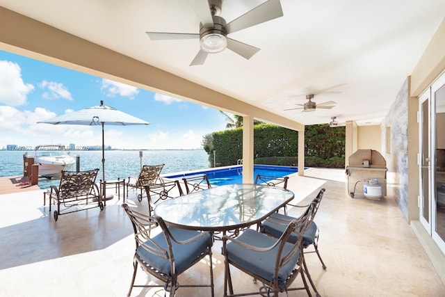 1500 NE 103rd St, Miami Shores, FL 33138 - view of patio with a ceiling fan, area for grilling, outdoor dining area, and a water view