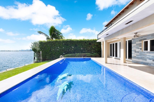 view of pool featuring a fenced in pool, a ceiling fan, a patio, and a water view