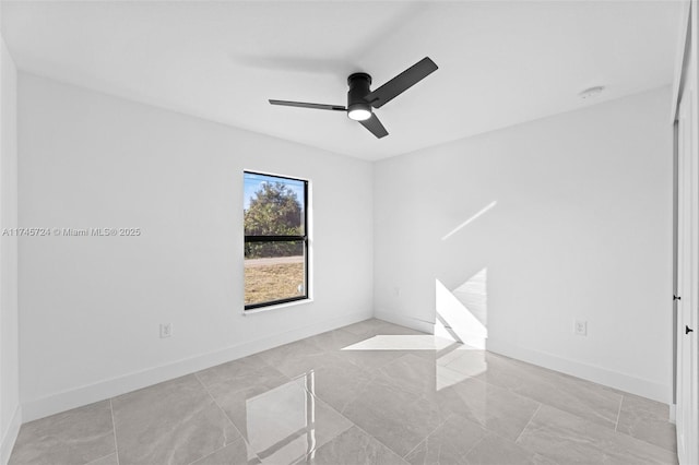 unfurnished room featuring ceiling fan