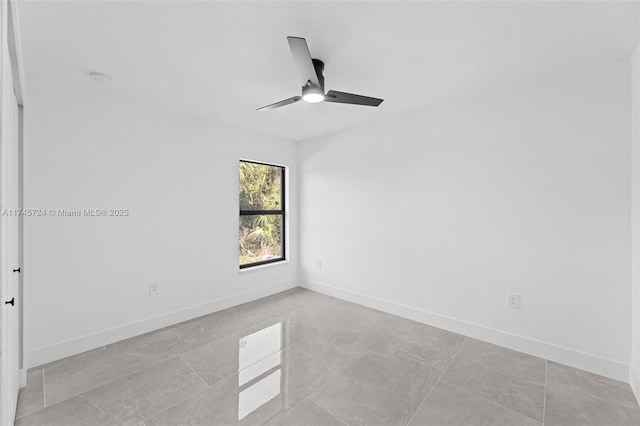 spare room featuring ceiling fan