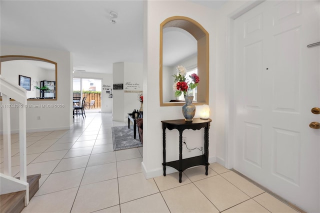 foyer entrance featuring light tile patterned floors