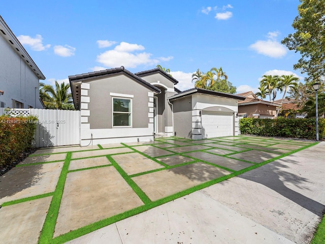 view of front of property with a garage