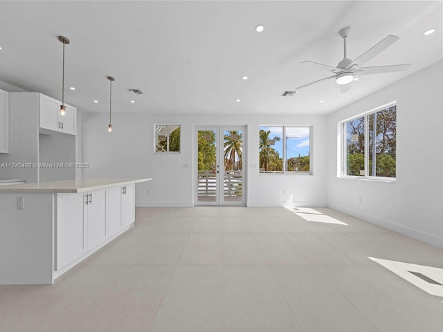 interior space with recessed lighting, visible vents, and french doors