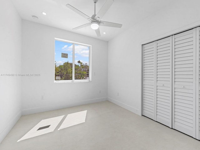 unfurnished bedroom with a closet, visible vents, and baseboards