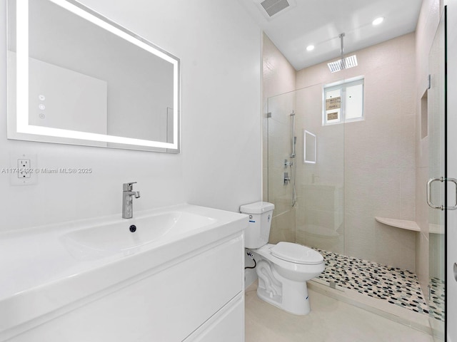 full bathroom featuring toilet, a stall shower, visible vents, recessed lighting, and vanity