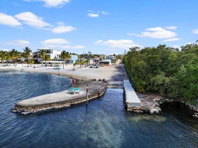 dock area featuring a water view