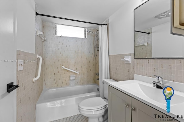 full bathroom with vanity, tile walls, shower / tub combo with curtain, and toilet